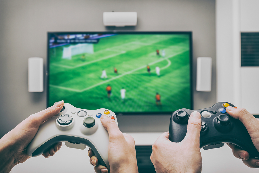 Playing football game on console
